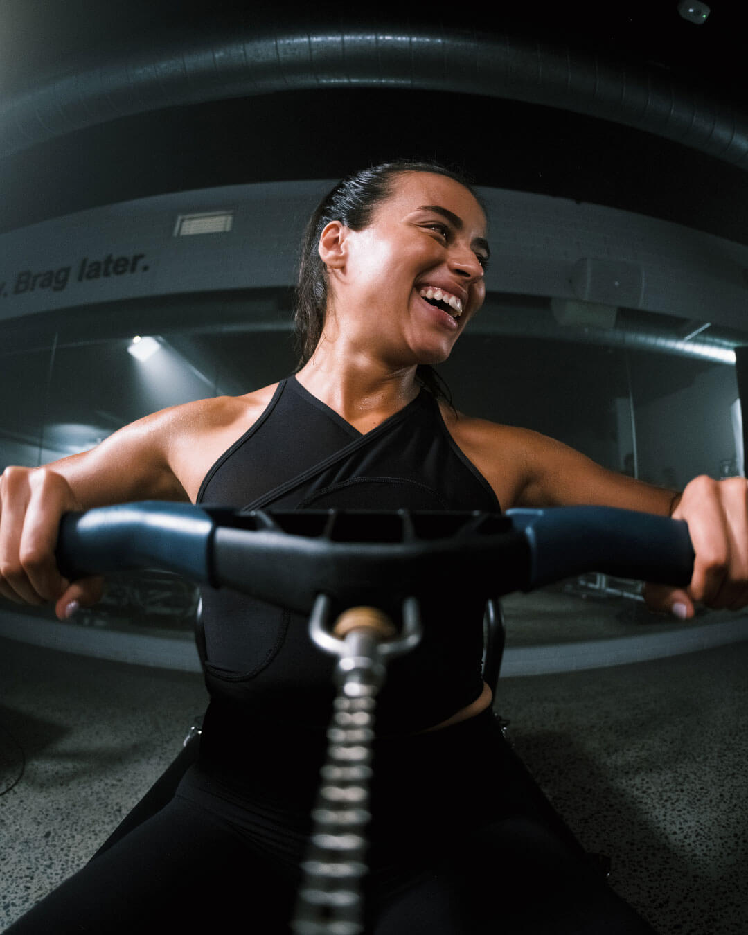 Member gripping the handlebar of a Rowformer